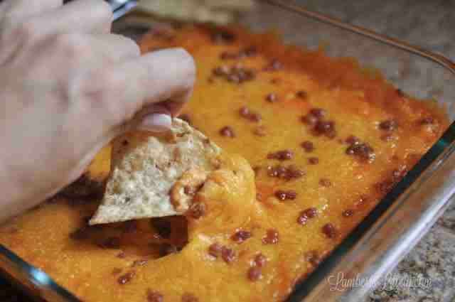This recipe for Bacon Buffalo Chicken Dip is so easy for gameday! It has all of the flavors your guests love: ranch, cheddar, chicken, and just the right amount of heat. 