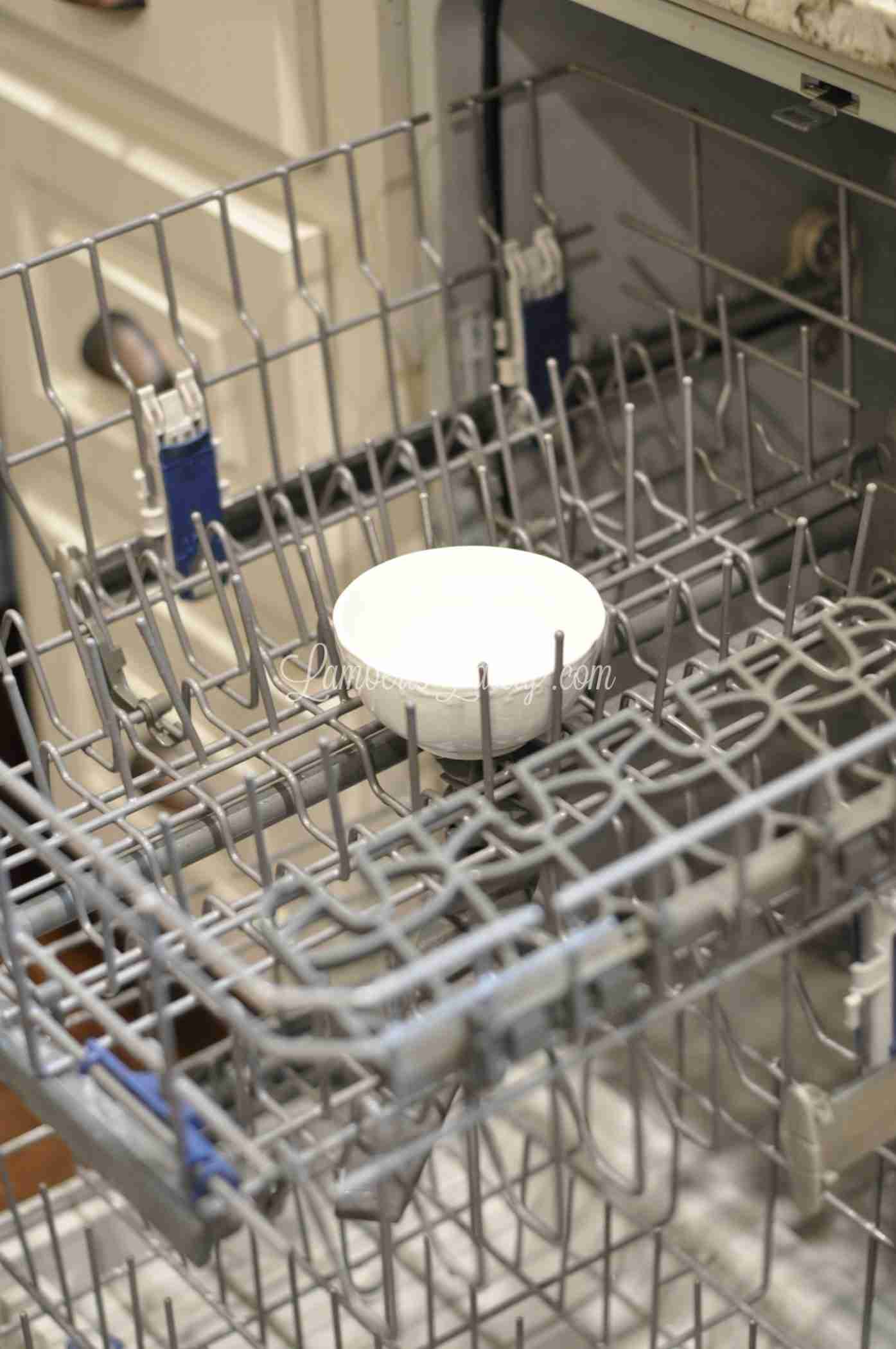 This post shows how to deep clean a dishwasher with vinegar and baking soda - see how to remove the filter and make your dishwasher so much more efficient when cleaning and drying!